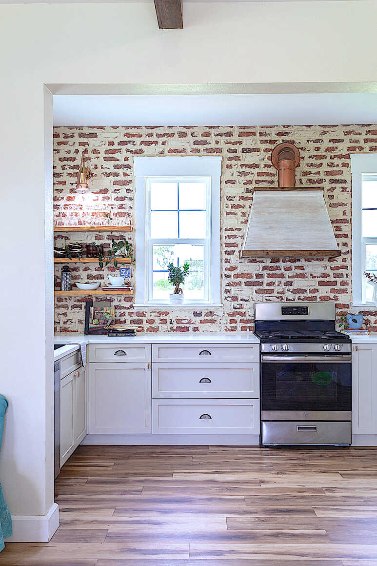 A farmhouse looks in cinder block wall painting with exposed bricks and unfinished touch