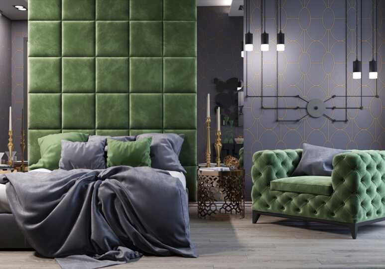 A green velvet furniture and Gray bedding set in a luxurious bedroom