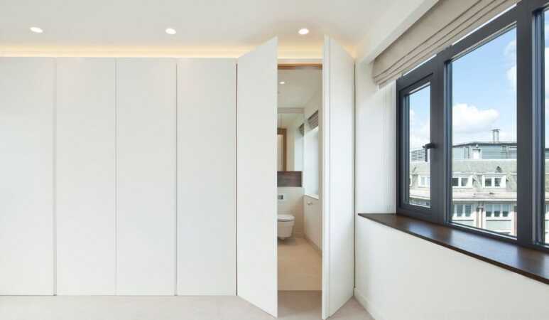 The full height door style to maximize the small bathroom